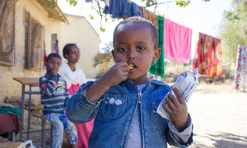 Tigray - A three-year-old girl in western Tigray eats a high energy biscuit to boost her nutrition levels-ff2a185f890d420af4b5a19368dd1ee81623379670.jpg
